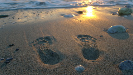 Fototapeta na wymiar Foot print in the sand