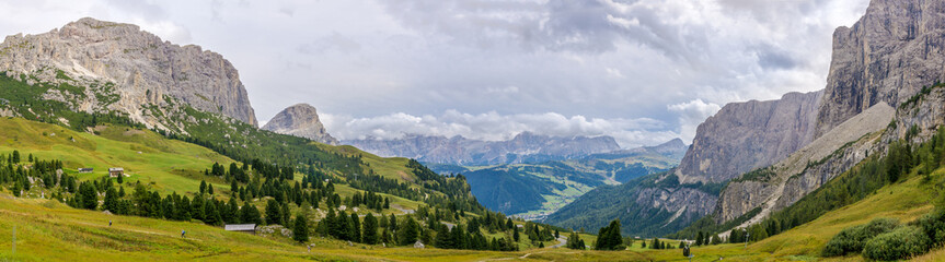 Fototapeta premium Panoramic view from road to Gardena Pass in Italy Dolomites
