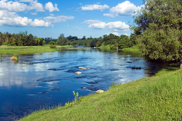 Landscape with river with the green shores
