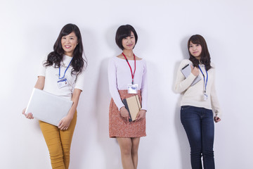 Obraz premium 社員証をつけた女性たち