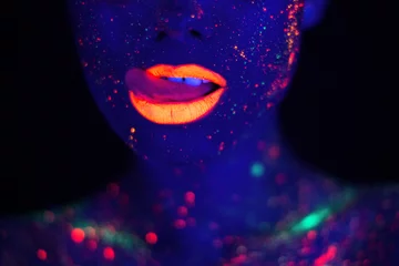 Foto op Plexiglas Portrait of Beautiful Fashion Woman in Neon UF Light. Model Girl with Fluorescent Creative Psychedelic MakeUp, Art Design of Female Disco Dancer Model in UV, Colorful Abstract Make-Up © ladie_c