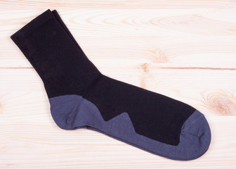 pair of socks on the wooden table