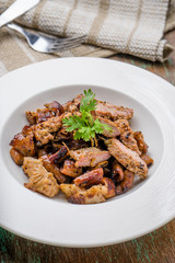 Grill pork on wooden table.  (Thai style food)