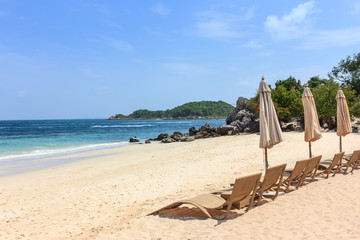 relax vacation, wood chair on the beach, sand, sea and sky in Th