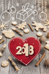 Christmas heart shaped gingerbread background. Winter holidays atmosphere. Snoflakes. Greeting card for Christmas and New Year`s Eve holiday 2018.Winter holiday poster.