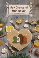 Christmas heart shaped gingerbread background. Snoflakes. Greeting card for Christmas and New Year`s Eve holiday 2018.Winter holiday poster.