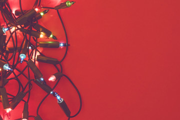 Christmas lights on a red background