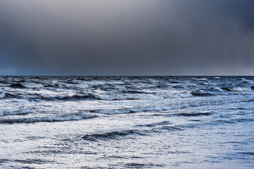 Dark sky over gulf of Riga, Baltic sea.