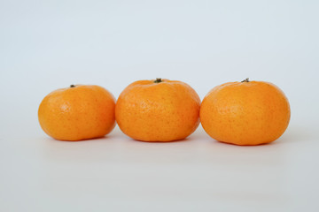 Orange fruit isolated on white