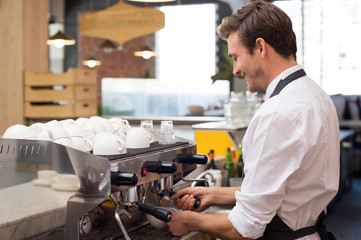 Waiter preparing coffee