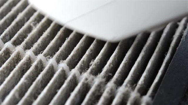 vacuum cleaner sucking dust on a filter