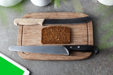 ry bread breakfast on a cutting board with the ipad as entertain