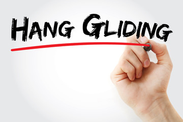 Hand writing Hang gliding with marker, concept background