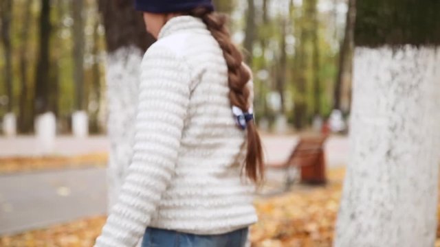 smiling little girl riding on gyroscooter