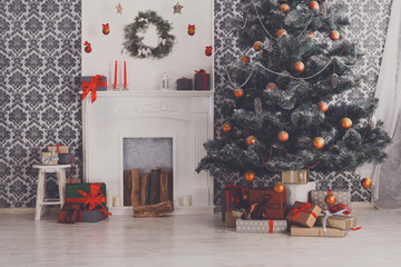 Beautiful christmas decorated tree in modern interior, holiday concept