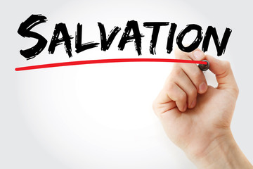 Hand writing Salvation with marker, concept background