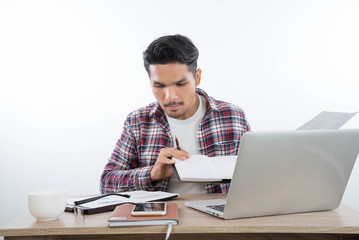 Fototapeta premium business man with laptop notebook and smartphone in the office