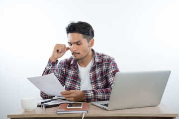 business man with laptop notebook and smartphone in the office