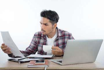 business man with laptop notebook and smartphone in the office