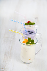 Smoothies or yogurt with fresh berries. Milkshakes with raspberr