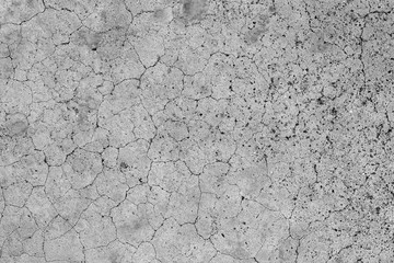 Aged cracked concrete stone plaster wall background and texture