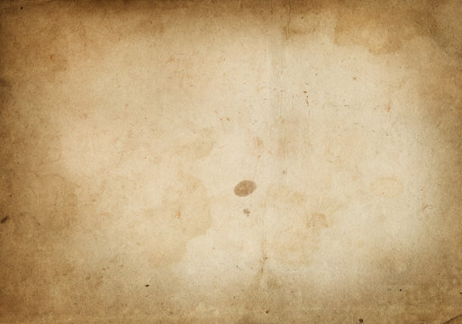 Old yellowed and stained paper texture.