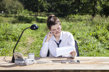 business woman carefully read a new contract