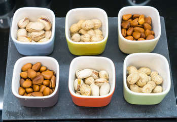 Variety nuts and raisins from above on the table