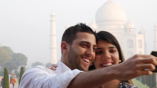Couple taking a selfie in Taj Mahal, Agra, India