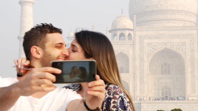 Couple Taking A Selfie In Taj Mahal, Agra, India