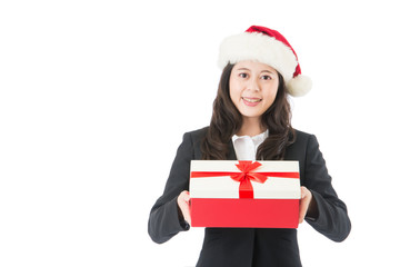 Christmas business woman smiling holding present