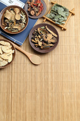 Traditional Chinese medicine on bamboo desk