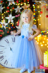 beautiful little girl in a festive interior