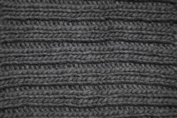 Gray wool rib stitch knitting pattern background