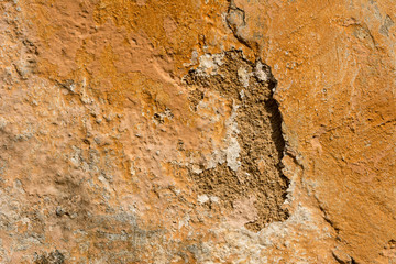 Close up from mediterran colored plastered old wall