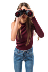 Young teenager girl with binoculars