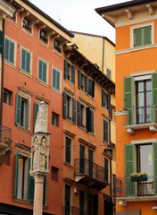 Fototapeta na wymiar column with statues in the street of the downtown of Verona in I