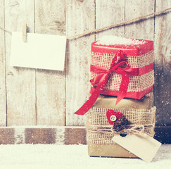 Christmas concept with various gifts on a wooden background. Chr