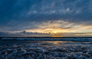 Stormy sunset in the beach