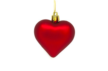Red Christmas bauble, heart shaped. Isolated on white