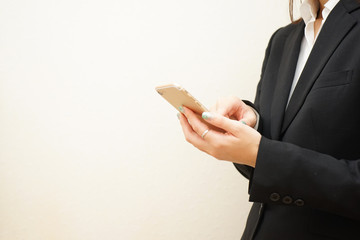 Business woman using smart phone at office