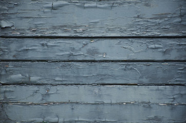Old blue flakey pained wood background texture
