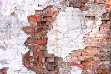 ragged stucco on brick wall