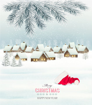 Winter christmas background with a snowy village landscape and s