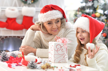 Grandmother and child with gift