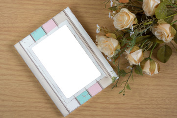 Picture frame with rose flowers.