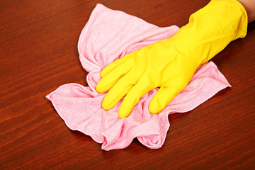 hand with microfiber cloth