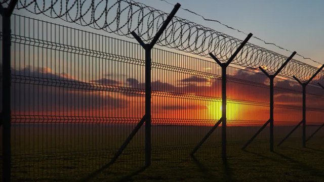 boundary fence on sunset animation looped
