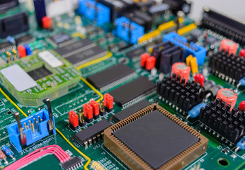 Closeup of electronic circuit board with electronic components b