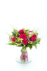 Wedding bouquet made of red roses on a white background
